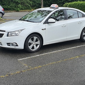Taxi des coteaux , un taximan à Muret